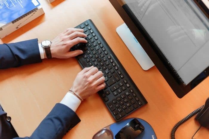 Man Working on a Desktop Monitor